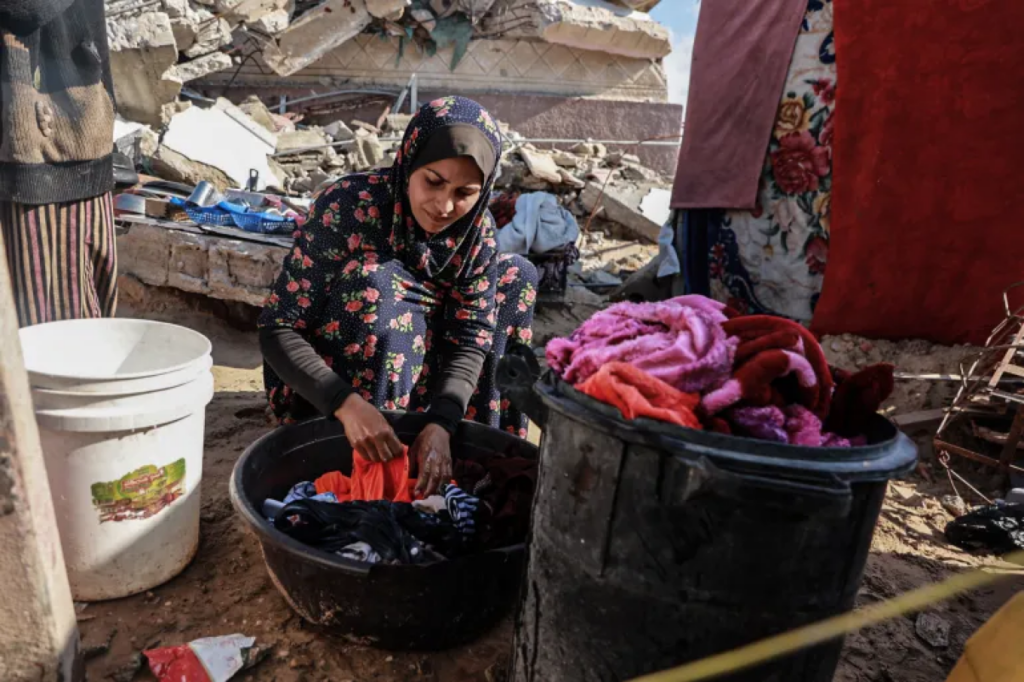 The Abu Haloub family has to painstakingly haul jugs and buckets of water for everything from cooking to bathing and cleaning Abdelhakim Abu Riash Al Jazeera 1740149667 Bathing Once Every 10 Days: The Harsh Reality of Northern Gaza’s Water Crisis