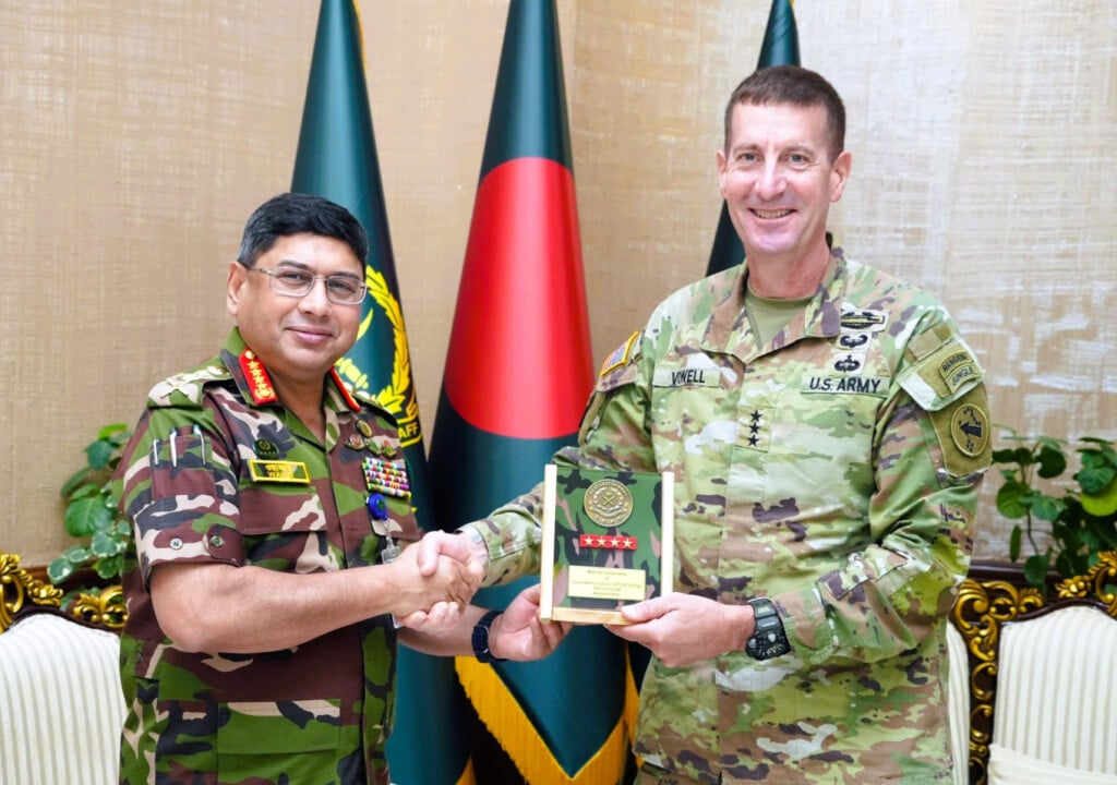 Bangladesh Army Chief General Waker-Uz-Zaman shakes hands with U.S. Lt. Gen. Joel B. Vowell during a courtesy meeting at Army Headquarters in Dhaka.