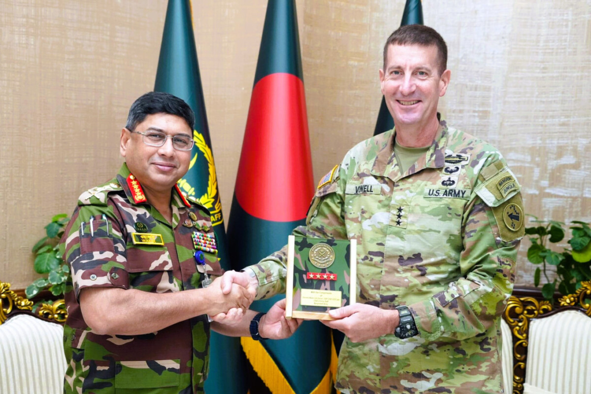 Bangladesh Army Chief General Waker-Uz-Zaman shakes hands with U.S. Lt. Gen. Joel B. Vowell during a courtesy meeting at Army Headquarters in Dhaka.