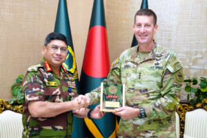 Bangladesh Army Chief General Waker-Uz-Zaman shakes hands with U.S. Lt. Gen. Joel B. Vowell during a courtesy meeting at Army Headquarters in Dhaka.