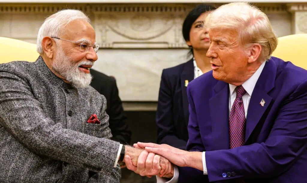 Indian Prime Minister Narendra Modi and U.S. President Donald Trump shake hands during a meeting.