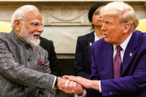 Indian Prime Minister Narendra Modi and U.S. President Donald Trump shake hands during a meeting.