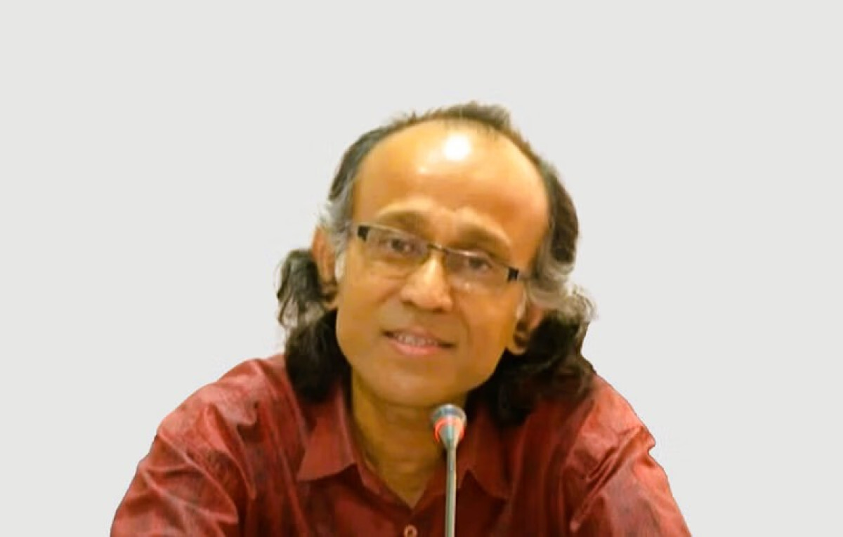 Rakhal Raha speaking at an event.