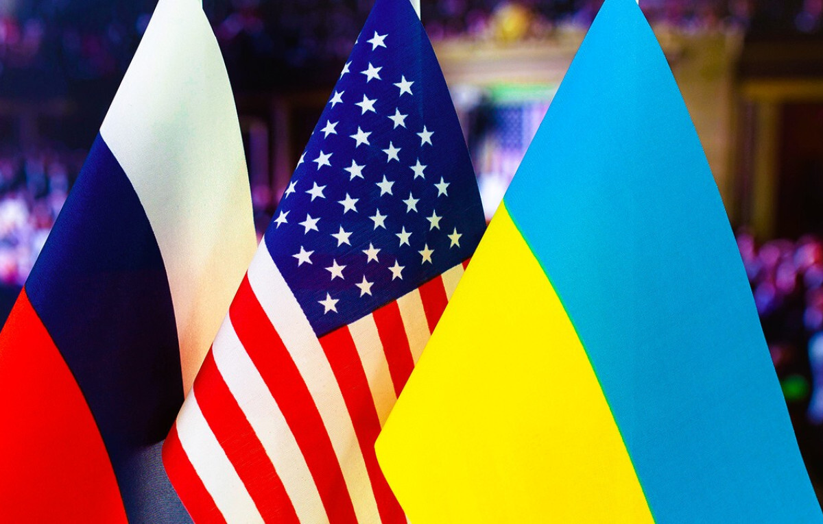 "Flags of Russia, the United States, and Ukraine symbolizing diplomatic discussions on the Ukraine conflict.