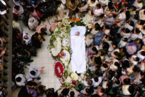 Aerial view of mourners surrounding the flower-covered body of Dr Sanjida Khatun at Chhayanaut Sangskriti Bhaban in Dhaka.