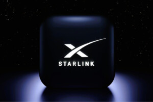 Starlink logo glowing against a dark, starry background, representing SpaceX's satellite internet service.