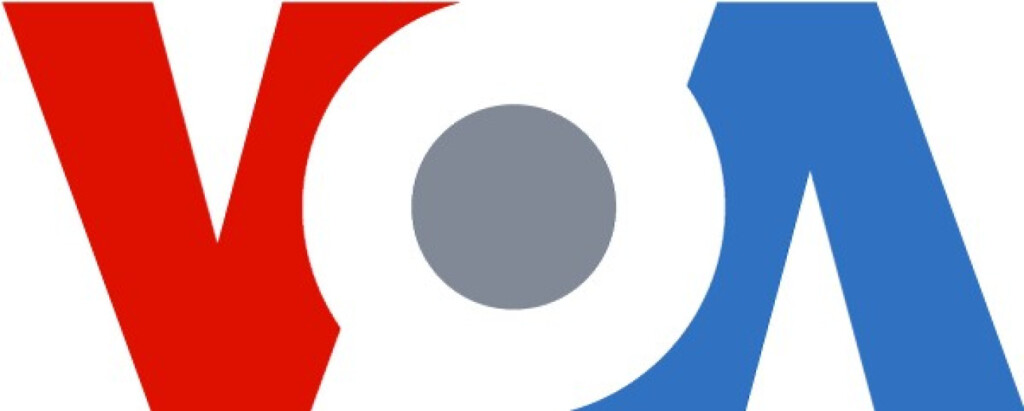Voice of America (VOA) logo, featuring bold red, blue, and gray design elements.