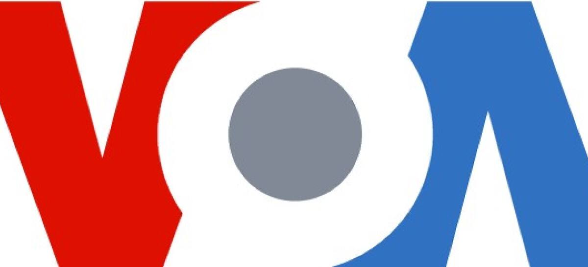Voice of America (VOA) logo, featuring bold red, blue, and gray design elements.