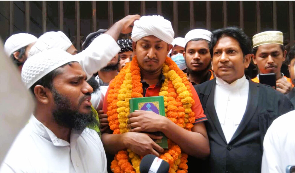 Mostofa Asif surrounded by supporters after being granted bail in Dhaka.