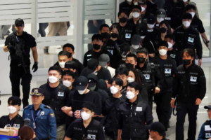 64 South Koreans Detained in Cambodia Return Home Under Arrest