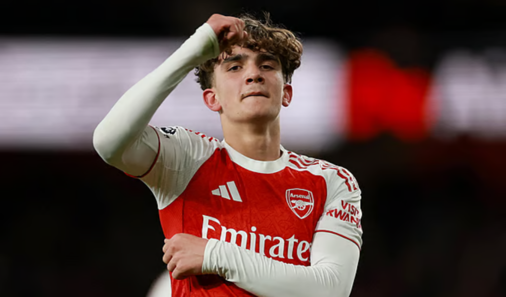 arsenal near title as dowman makes history Arsenal Near Title as Dowman Makes History