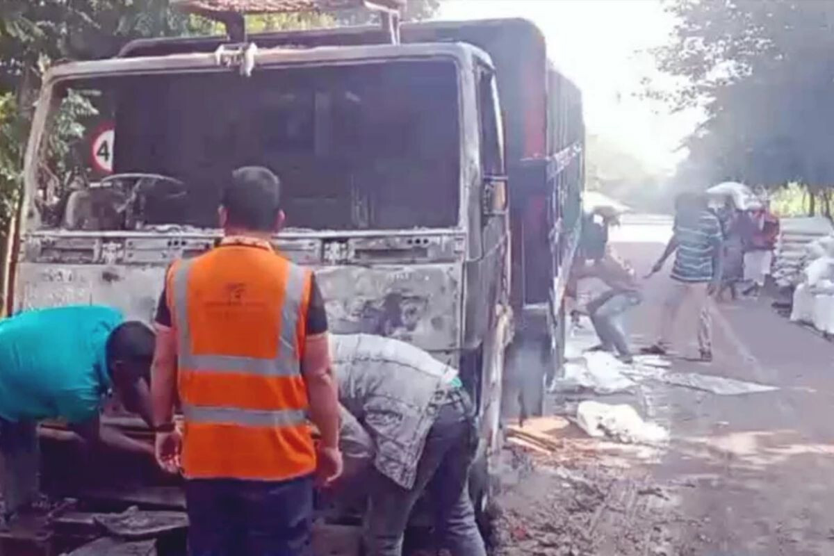 Fire on a cargo truck and attack on police vehicles in Madaripur