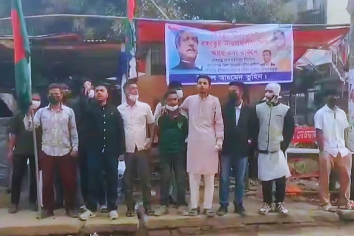 Flags Raised at Razed Party Office