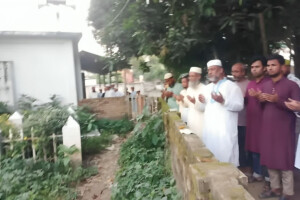 Jamaat MP Candidate Visits Grave of Awami League Leader