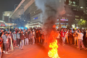 Mobile Phone Traders Block Road at Karwan Bazar, Bringing Traffic to a Standstill
