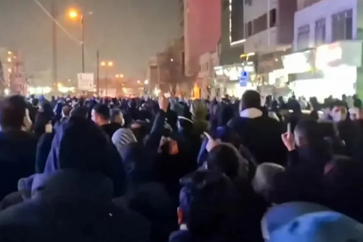 Mosque Set Ablaze, Protesters Raise Royal Flag