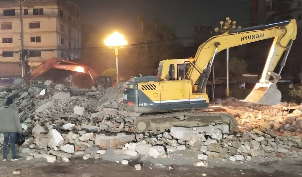 protesters bulldoze rajshahi awami league office in deadly uproar Protesters Bulldoze Rajshahi Awami League Office in Deadly Uproar