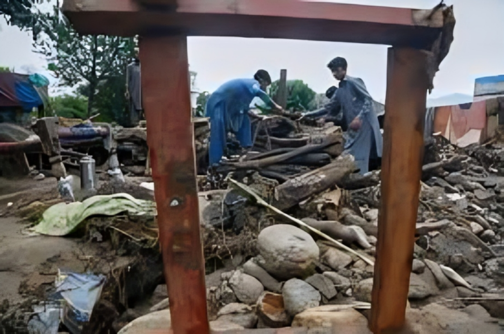 survivors dig through rubble after deadly cloudburst in pakistan Survivors Dig Through Rubble After Deadly Cloudburst in Pakistan
