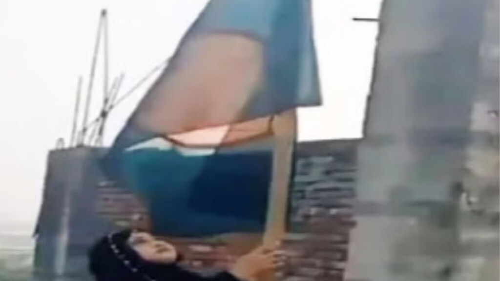 symbolic flag hoisting at abandoned party office Symbolic Flag Hoisting at Abandoned Party Office