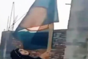 Symbolic Flag Hoisting at Abandoned Party Office