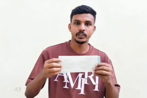 The bank gave a loan to the young man who abused using a microphone