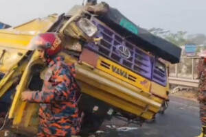Truck Overturns on Expressway After Bus Collision