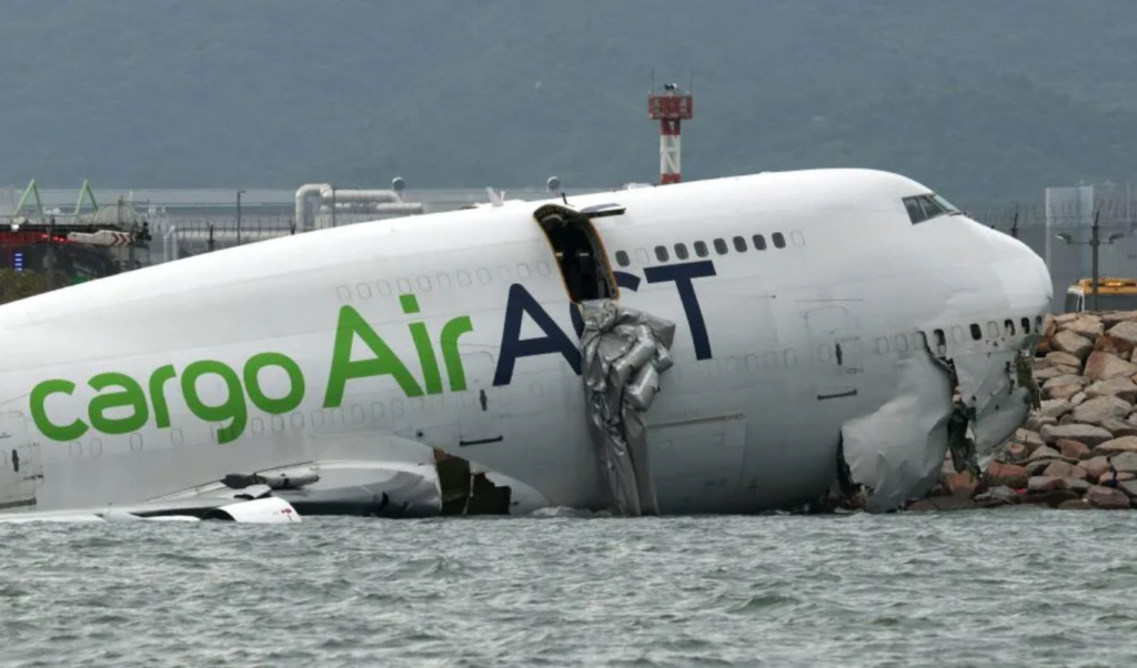 Two Killed as Cargo Plane Skids Off Runway and Plunges into Sea at Hong Kong Airport 3 two killed as cargo plane skids off runway and plunges into sea at hong kong airport Two Killed as Cargo Plane Skids Off Runway and Plunges into Sea at Hong Kong Airport
