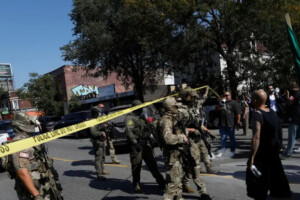 US Agent Shoots Chicago Motorist as Judge Blocks Troops to Portland