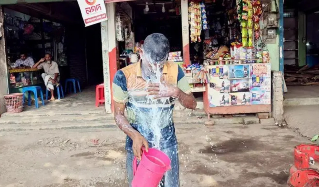volunteer wing leader quits politics after bathing in milk in thakurgaon Volunteer Wing Leader Quits Politics After Bathing in Milk in Thakurgaon