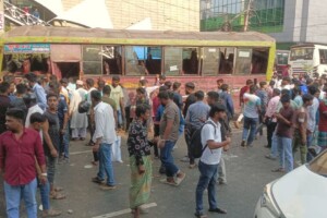 Two Workers Killed as Bus Hits Road Divider