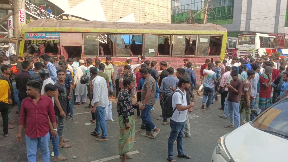 Two Workers Killed as Bus Hits Road Divider