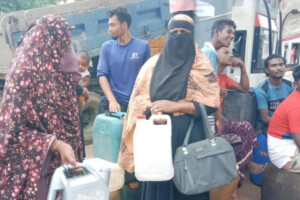 Women Queue to Support Family Fuel Needs