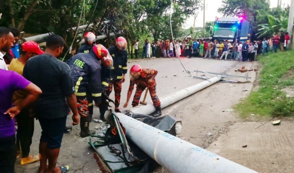 Teacher Killed as Fourteen Power Poles Collapse