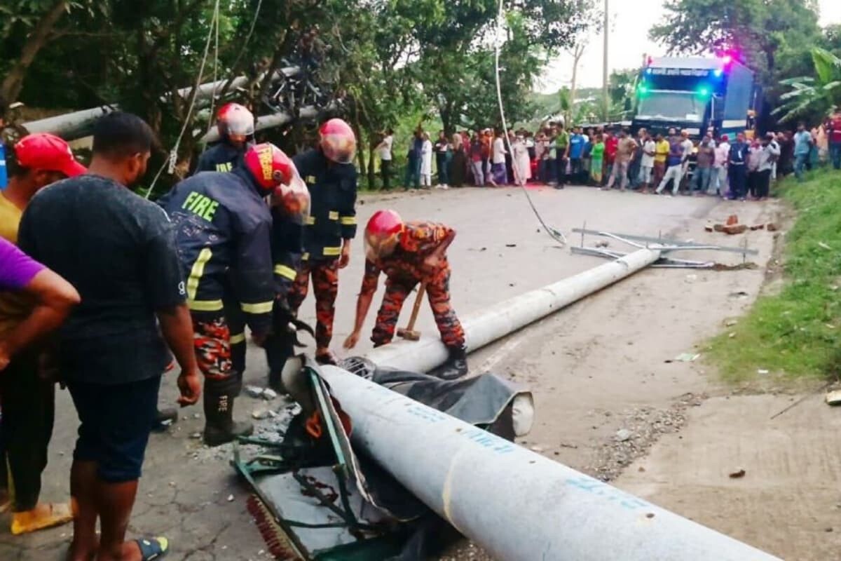 Teacher Killed as Fourteen Power Poles Collapse