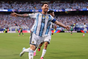 Argentina Reach Knockouts As Lionel Messi Makes History