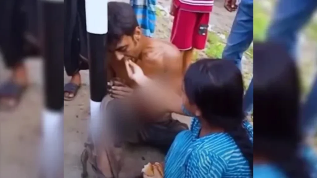 Heartbreaking Footage of Young Girl Feeding Bound Father Sparks Outrage 2 Heartbreaking Footage of Young Girl Feeding Bound Father Sparks Outrage